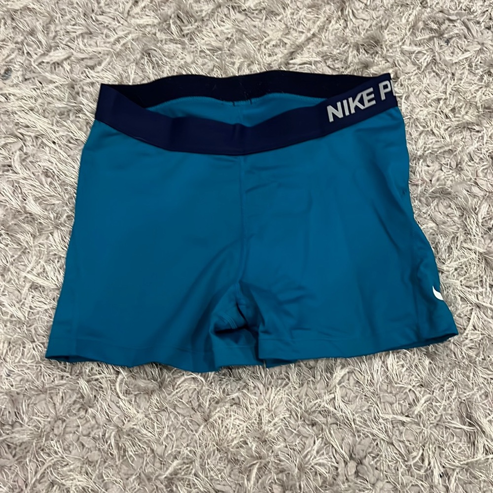 Teal blue Nike Pros 3” inseam